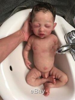 baby dolls with real body parts
