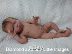 Full body Ecoflex 15 silicone baby Diamond girl sculpt by Hope Mason witharmatures