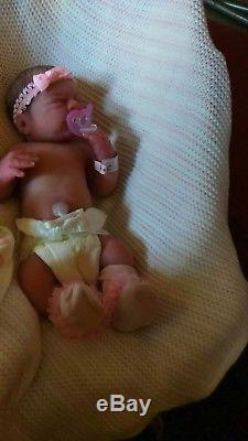 Full body silicone baby doll by Linda Moore
