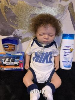 Full body silicone reborn brown skin baby boy with curly brown hair