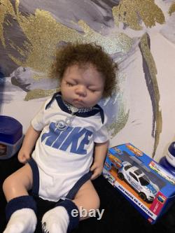 Full body silicone reborn brown skin baby boy with curly brown hair