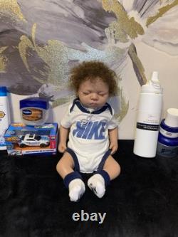 Full body silicone reborn brown skin baby boy with curly brown hair