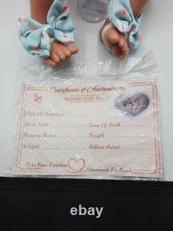 Girl Reborn Baby Doll with Pacifier, Bottle and COA
