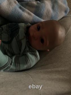 Hand painted reborn baby boy in perfect condition