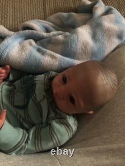 Hand painted reborn baby boy in perfect condition