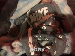 Hand painted reborn baby boy in perfect condition