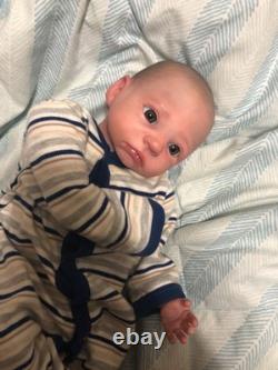 Hand painted reborn baby boy in perfect condition