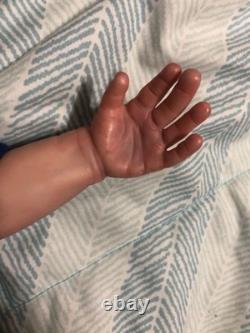 Hand painted reborn baby boy in perfect condition