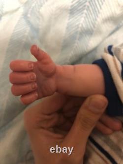 Hand painted reborn baby boy in perfect condition