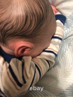 Hand painted reborn baby boy in perfect condition