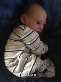 Hand painted reborn baby boy in perfect condition