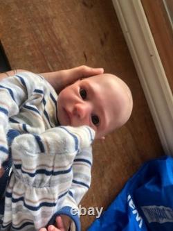 Hand painted reborn baby boy in perfect condition