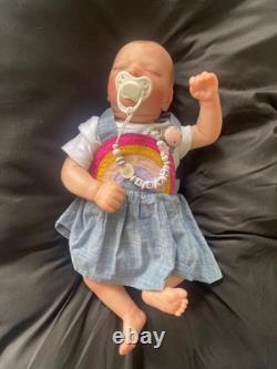 Preowned reborn silicone weighted baby dolls