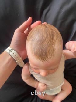 Preowned reborn silicone weighted baby dolls