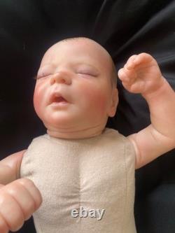 Preowned reborn silicone weighted baby dolls
