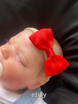 Preowned reborn silicone weighted baby dolls