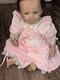 Realistic Reborn Doll 20 Baby Doll in Pink Dress Signed Artist Andrea Arcello