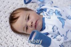 Reborn Doll. Ruby awake. Rooted hair and lashes full limbs acrylic eyes