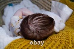 Reborn Doll. Ruby awake. Rooted hair and lashes full limbs acrylic eyes