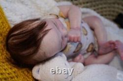 Reborn Doll. Ruby awake. Rooted hair and lashes full limbs acrylic eyes