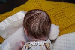 Reborn Doll. Ruby awake. Rooted hair and lashes full limbs acrylic eyes