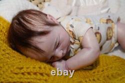 Reborn Doll. Ruby awake. Rooted hair and lashes full limbs acrylic eyes