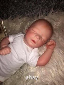 Reborn baby? Darren asleep