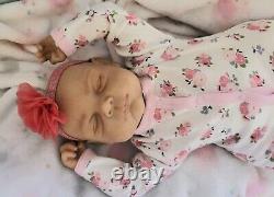 Reborn baby doll, pre-owned
