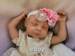 Reborn baby doll, pre-owned