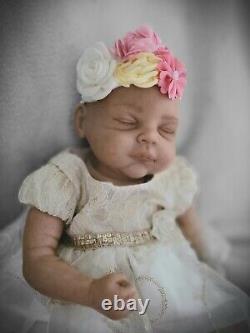 Reborn baby doll, pre-owned