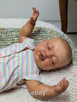 Reborn baby girl. Ethnic, African American, Bi racial. 23 inches