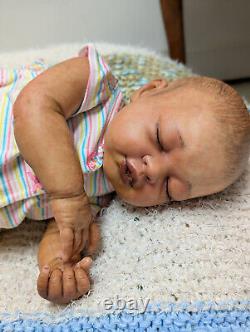 Reborn baby girl. Ethnic, African American, Bi racial. 23 inches