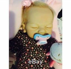 Reborn girl baby doll weighted, barely used, blonde hair