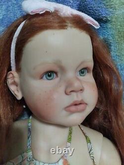Reborn toddler Angelica doll red hair and hazel eyes and freckles