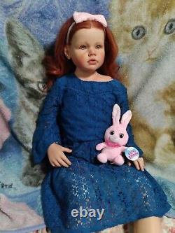 Reborn toddler Angelica doll red hair and hazel eyes and freckles