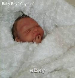Silicone Baby Boy 19 Cayden Painted And Rooted Hair