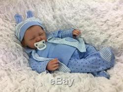 Stunning Reborn Baby Boy Doll Real Hand Rooted Hair Liam Silicone Feel